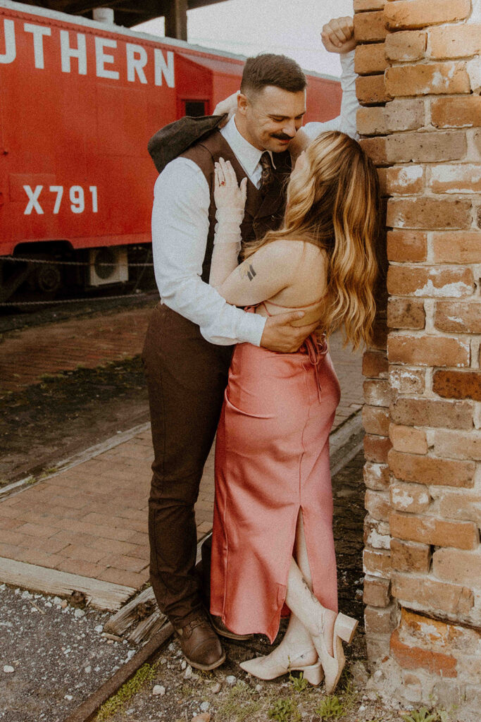 Creative Ideas For Engagement Photos | Vintage style photos with trains for a couple engagement photoshoot