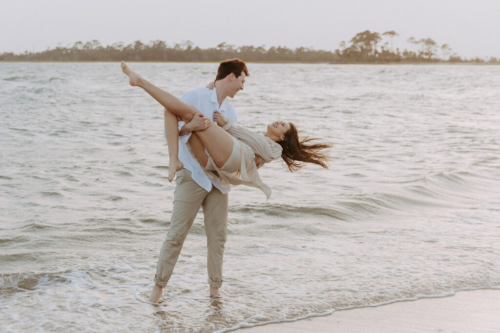 Creative Ideas For Engagement Photos | Couple playing in the water for their engagement 