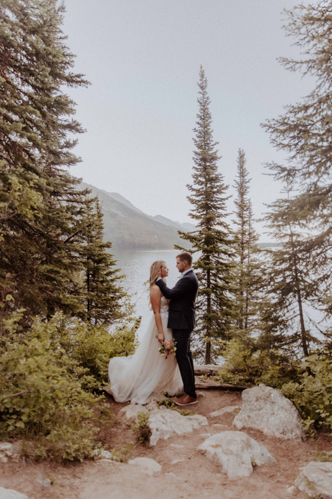 Couple hiking for wedding day photos
