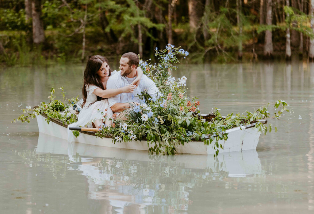 Creative Ideas For Engagement Photos | Couple taking a boat ride for their engagement photos