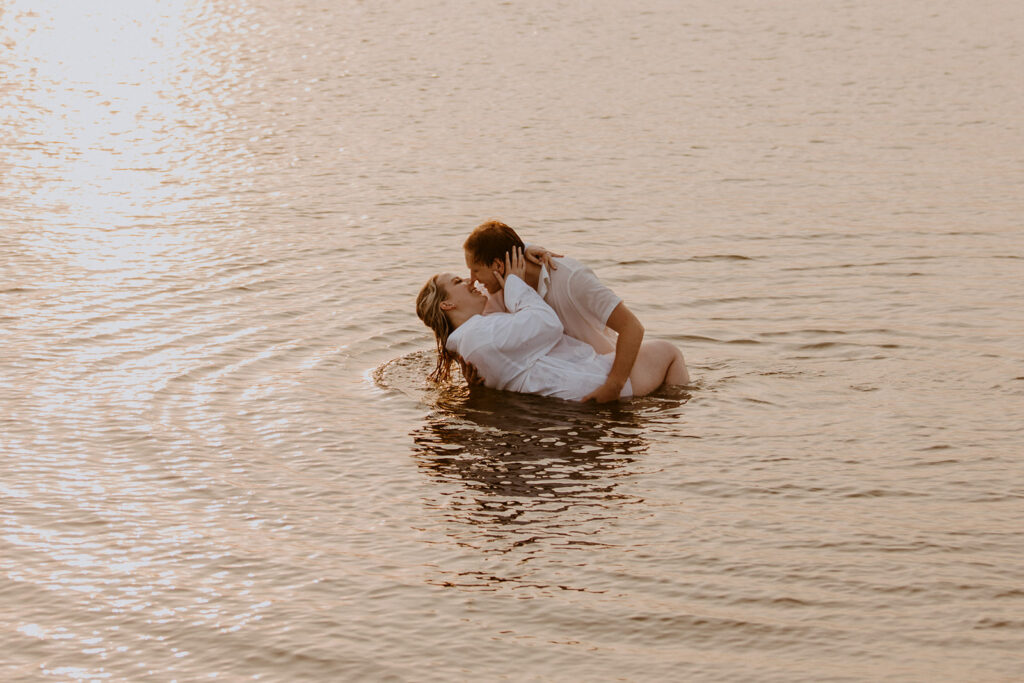 Creative Ideas For Engagement Photos | Couple playing in the water for their engagement 