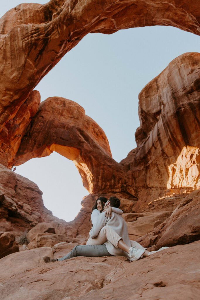 Creative Ideas For Engagement Photos | Couple exploring MOAB for their engagement 