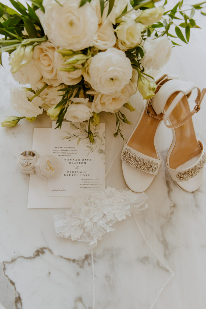 wedding details of flowers and wedding shoes