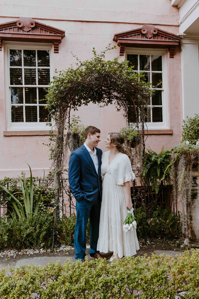 Cute picture of the bride and groom, smiling at each other