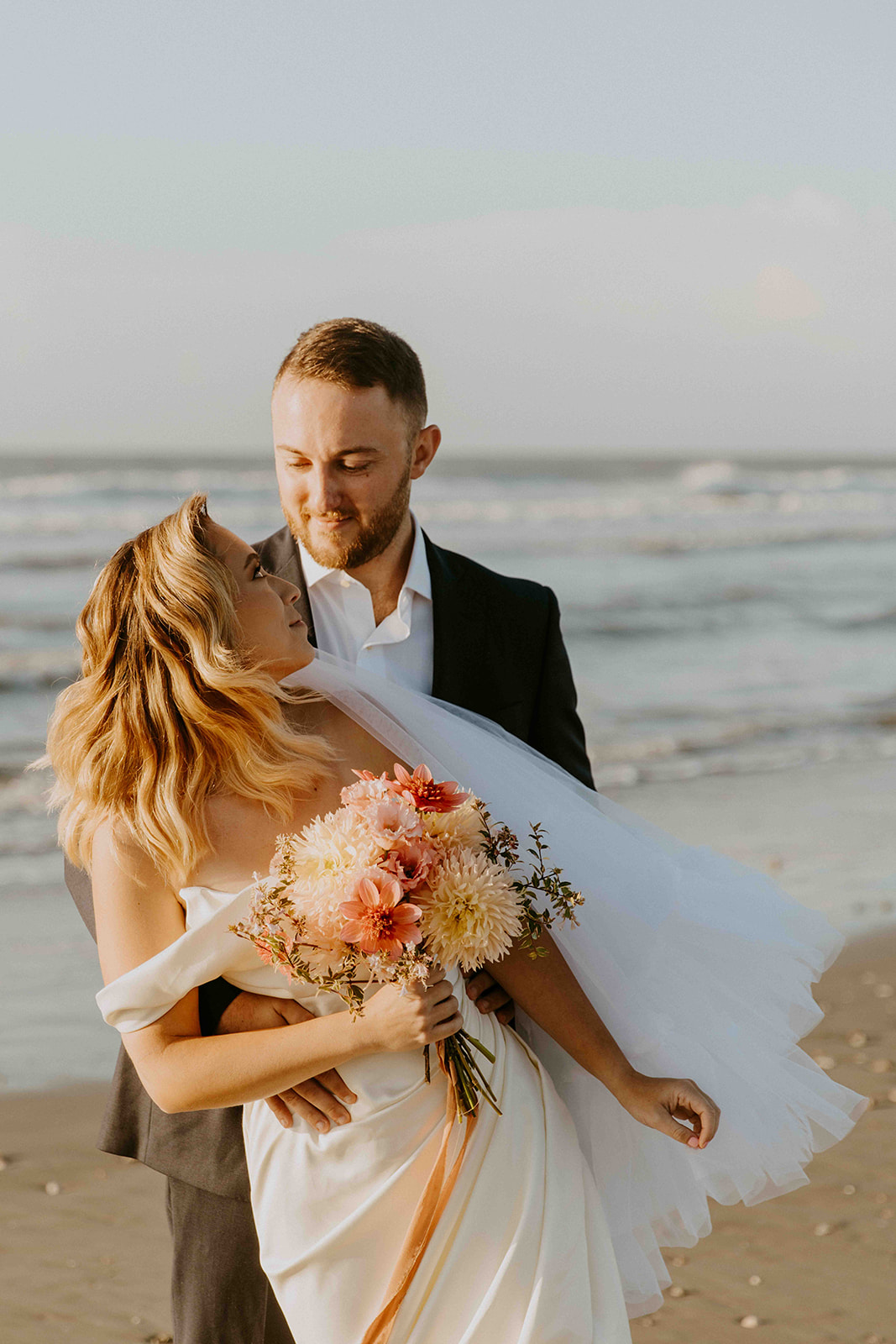 couple looking at each other -must have wedding poses