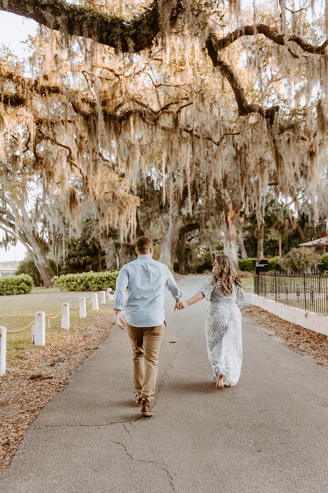 couple has a dreamy surprise proposal engagement session in the Isle of Hope in 