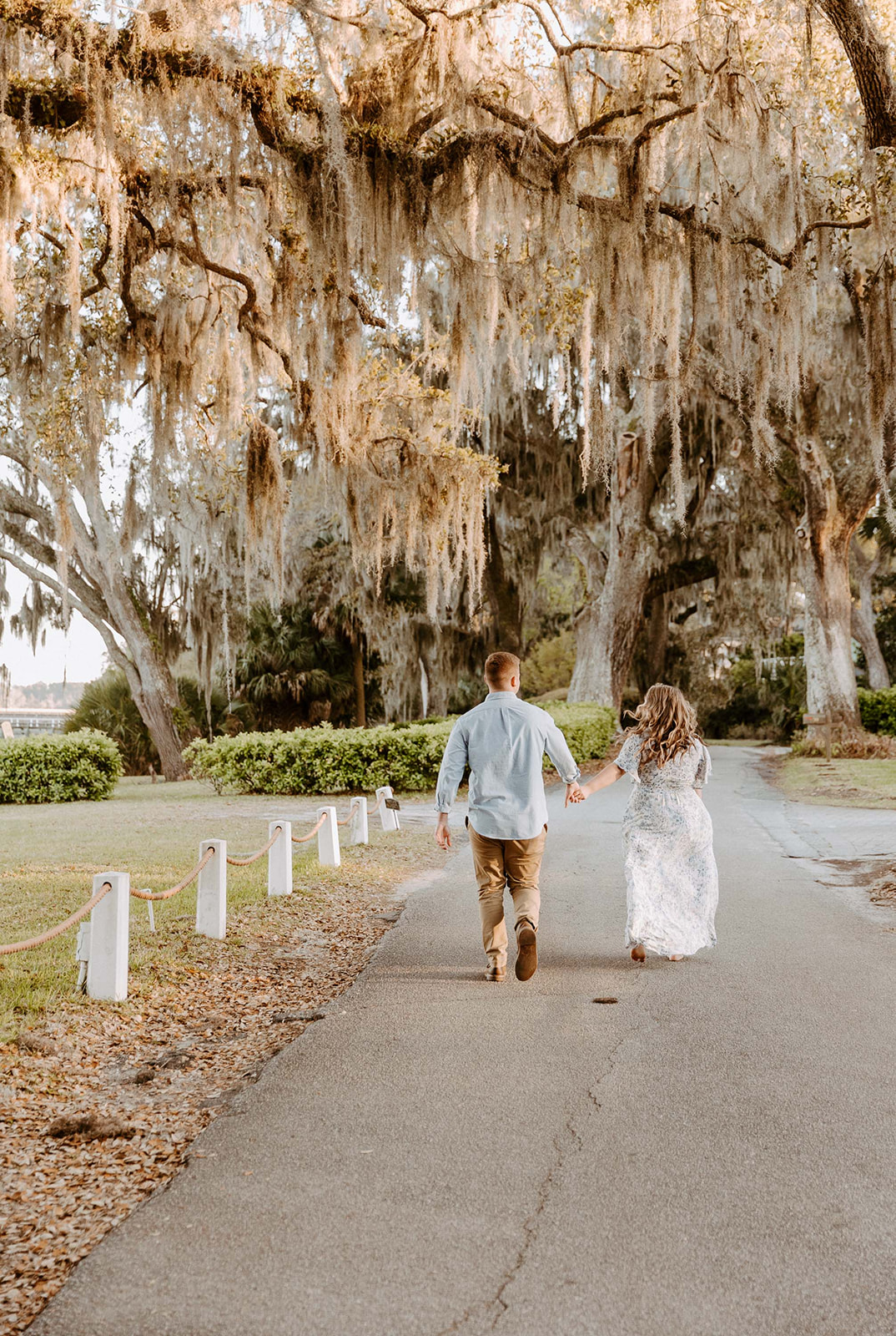 couple has a dreamy surprise proposal engagement session in the Isle of Hope in 