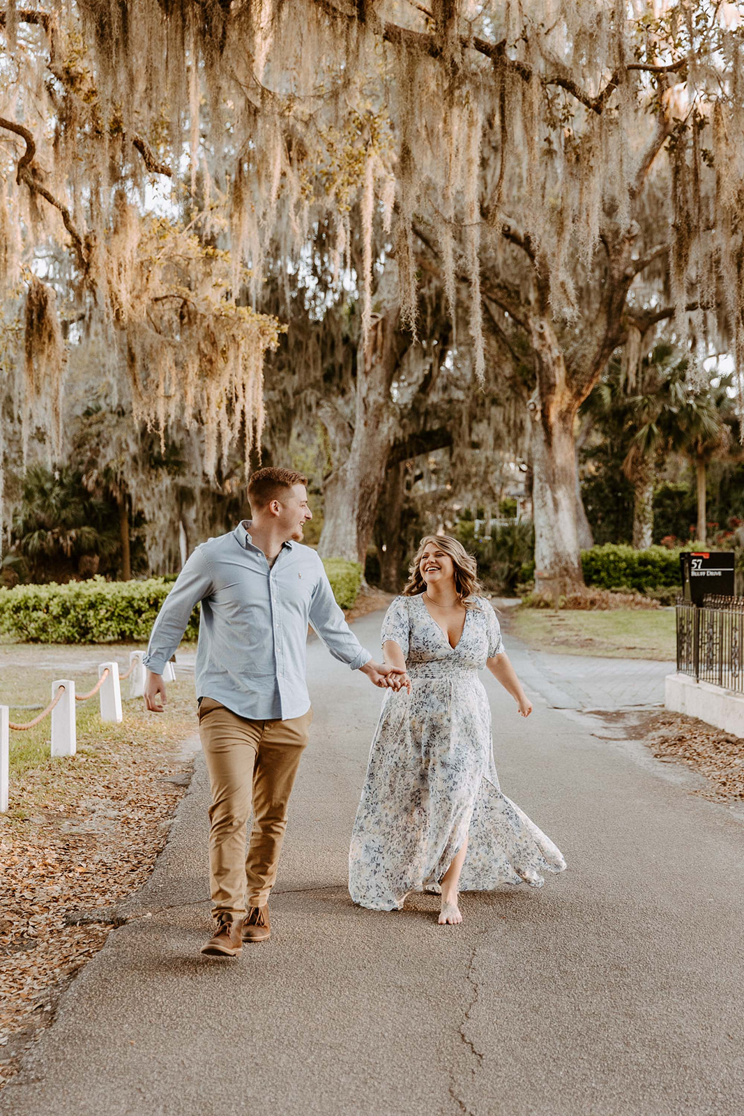 couple has a dreamy surprise proposal engagement session in the Isle of Hope in 