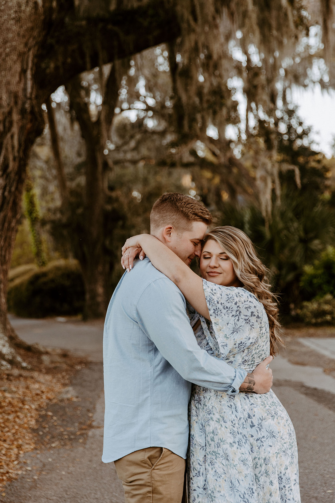 couple has a dreamy surprise proposal engagement session in the Isle of Hope in 