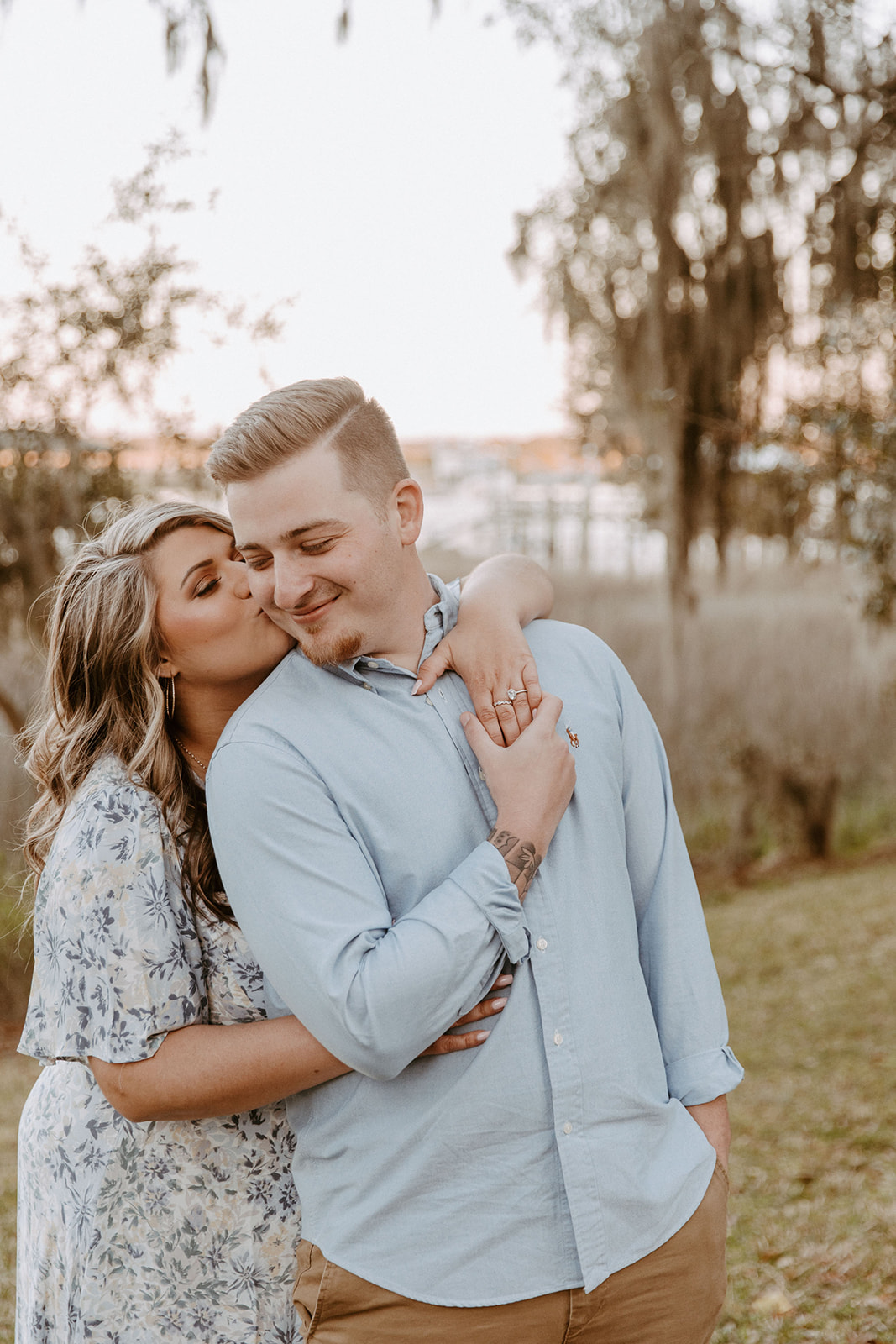 couple has a dreamy surprise proposal engagement session in the Isle of Hope in 