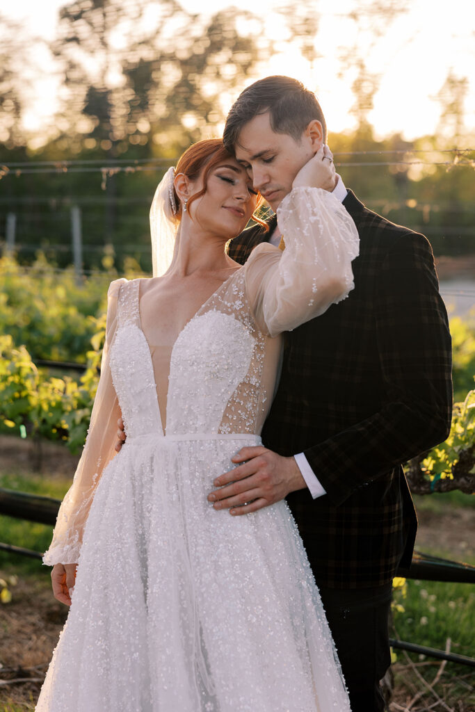 bride kissing the groom on the cheek