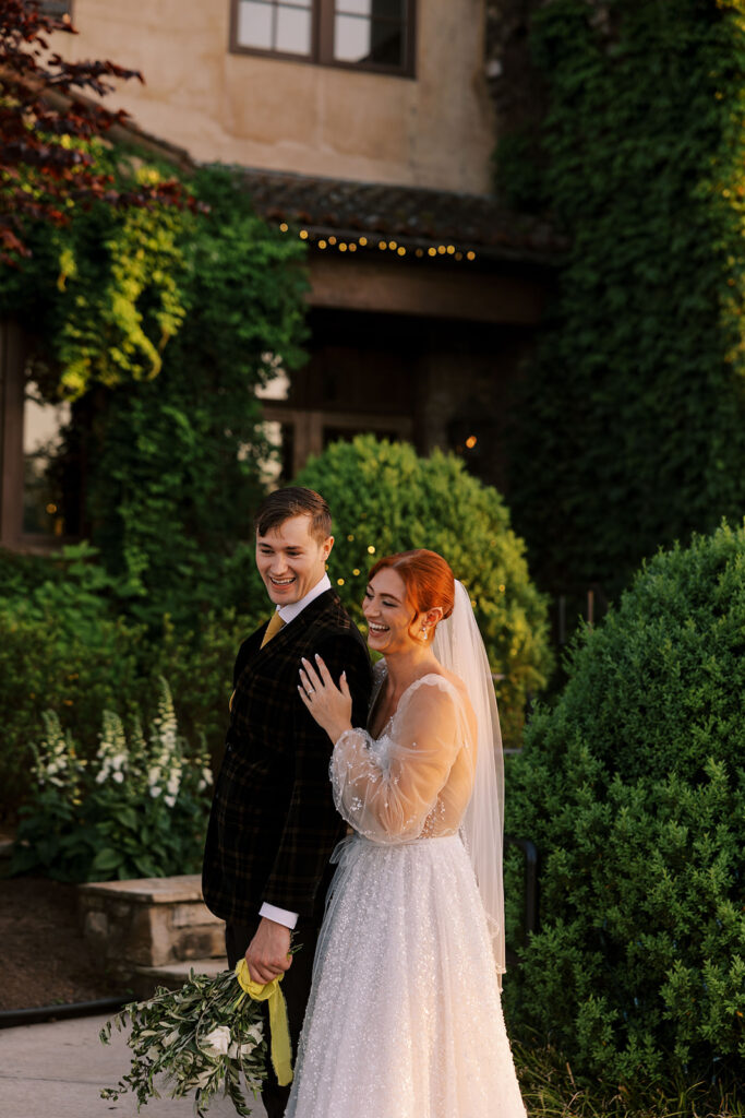 newlyweds laughing during their photoshoot