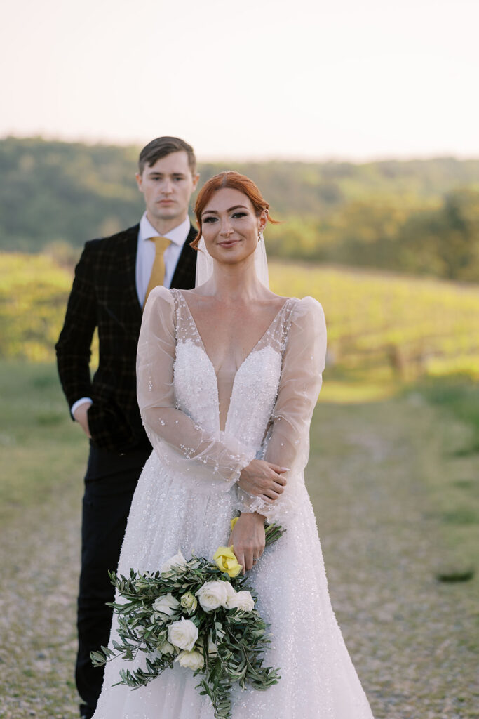 cute couple posing for the camera during their photoshoot