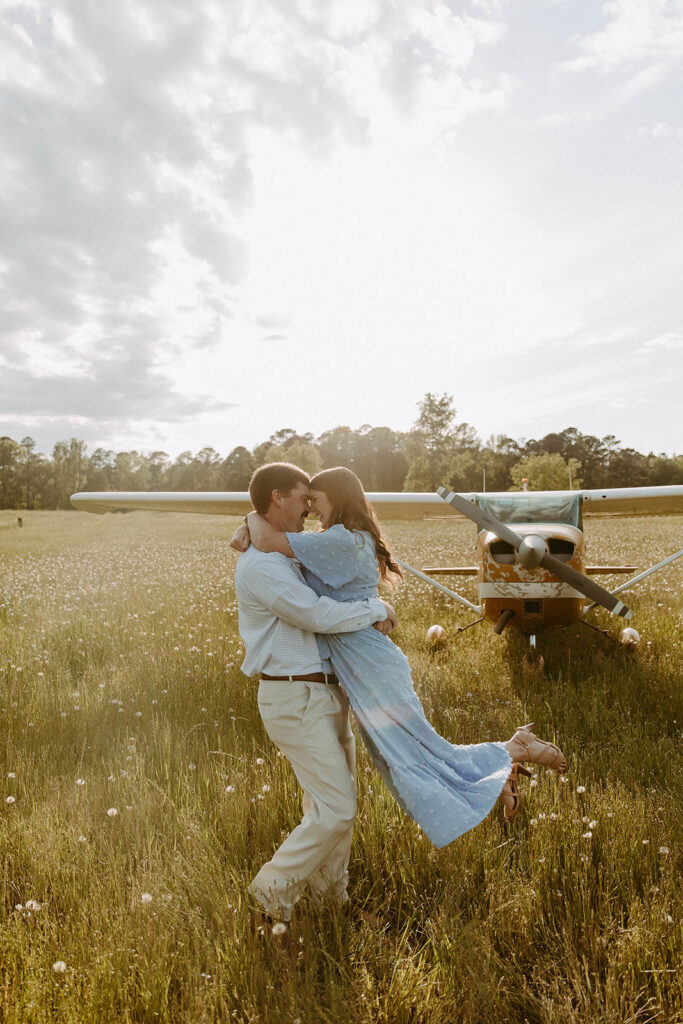 cute couple dancing during their photoshoot in Georgia 