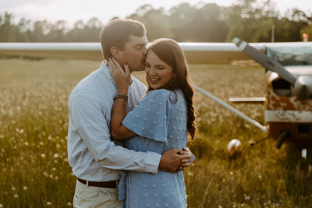 cute picture of the husband kissing his wife on the cheek
