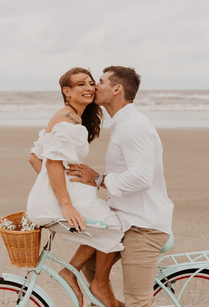 husband kissing his wife on the cheek