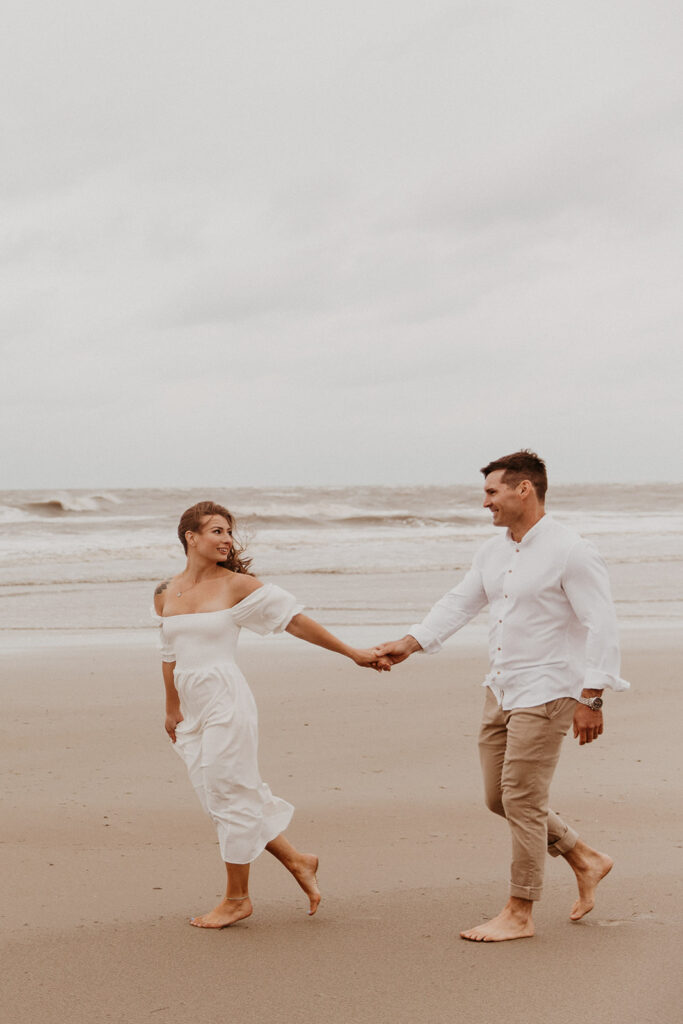 cute couple walking around their photoshoot location