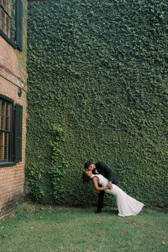 stunning portrait of the bride and groom kissing 