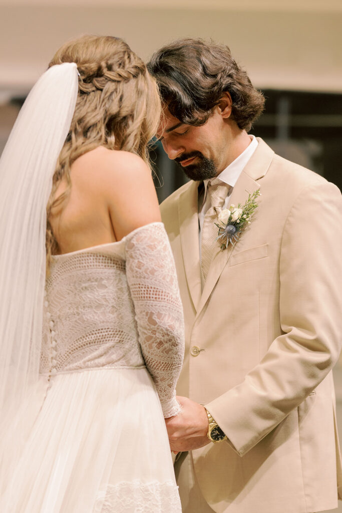 Bride and groom emotional at their wedding ceremony