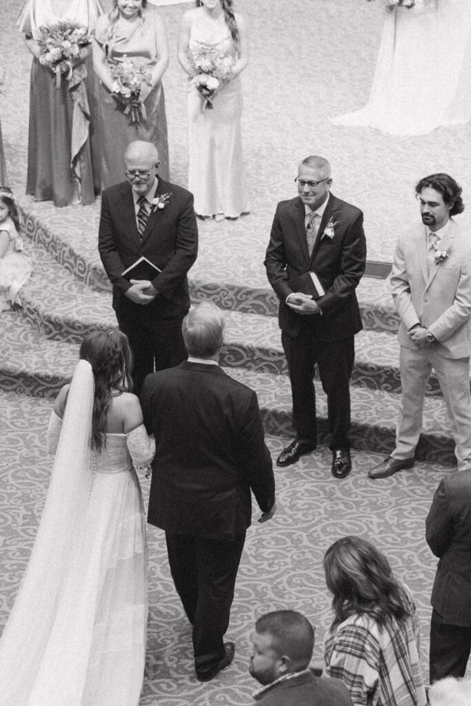Cute picture of the bride walking down the aisle