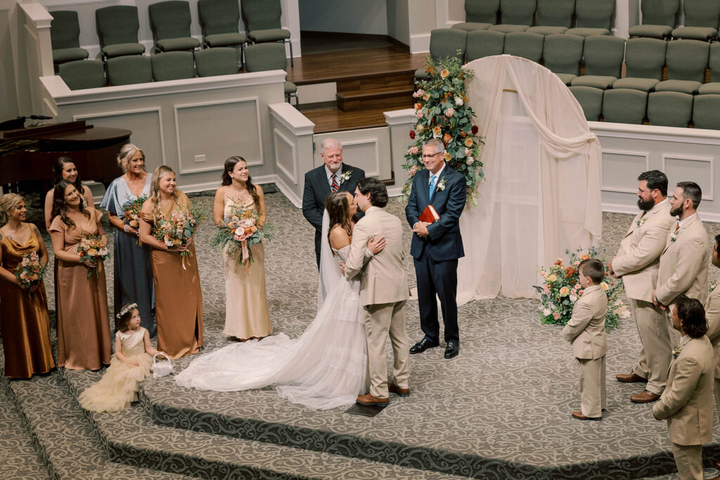 Couple kissing after the wedding ceremony