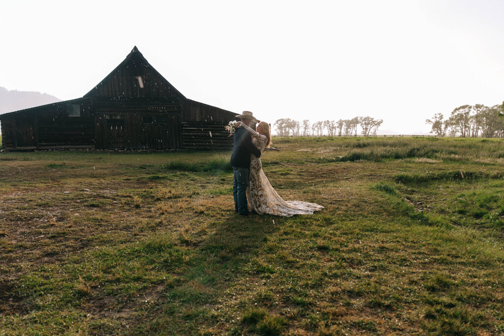 portrait of the bride and groom hugging during their golden hour photoshoot
