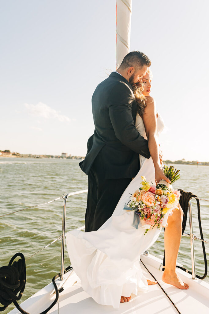 bride and groom at their playful bridal portraits 