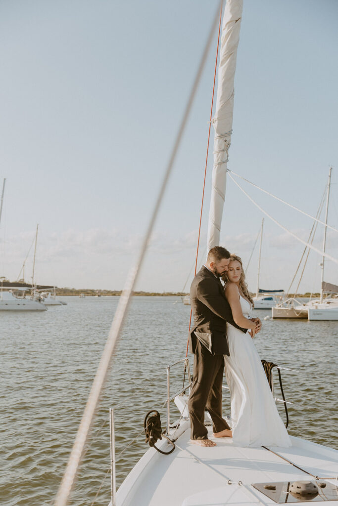 portrait of the newly eloped couple hugging during their photoshoot