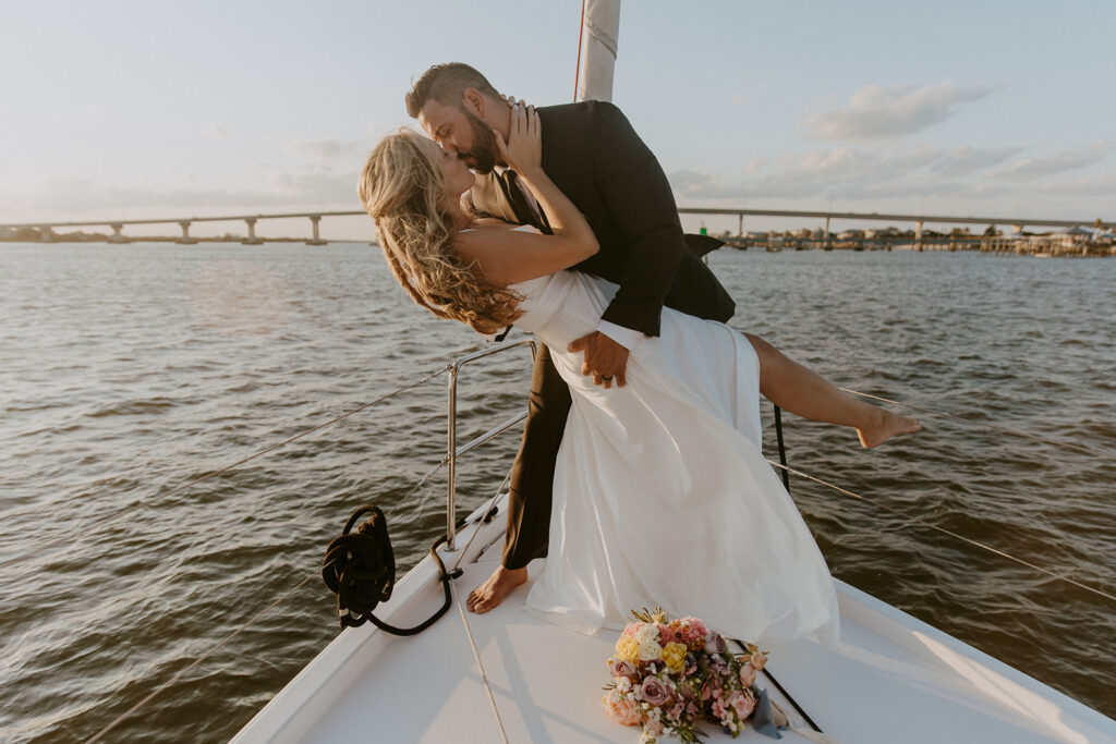 cute picture of the newly married couple kissing