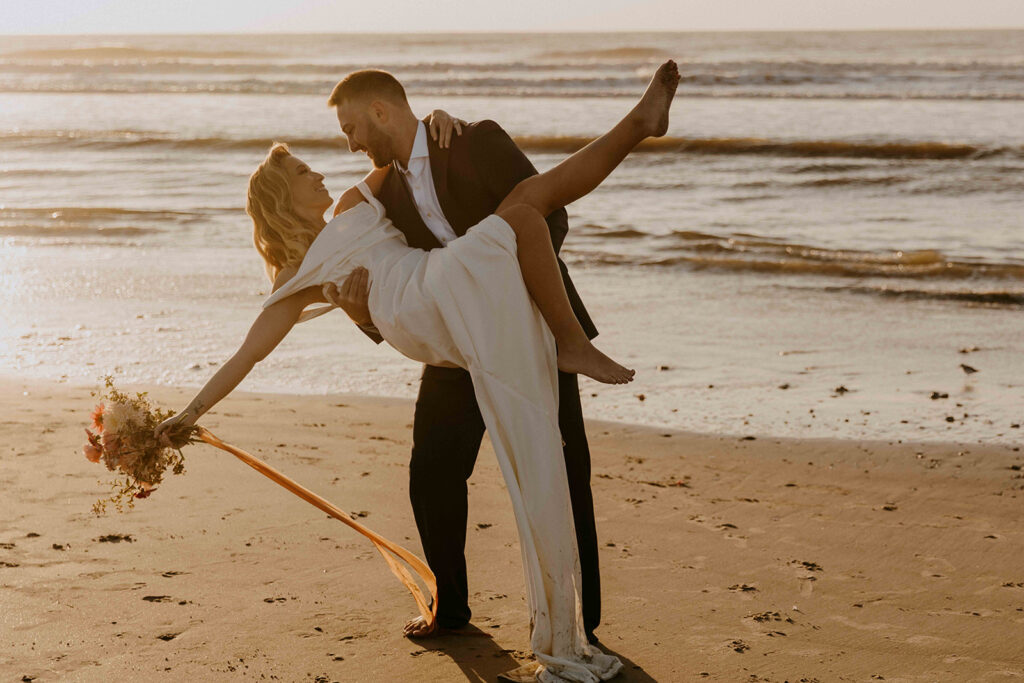newlyweds dancing during their bridal portraits 