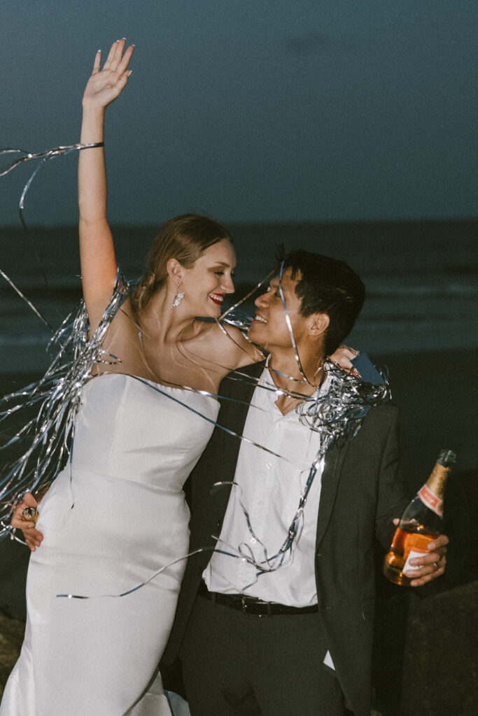 cute portrait of the bride and groom smiling at each other during their photoshoot