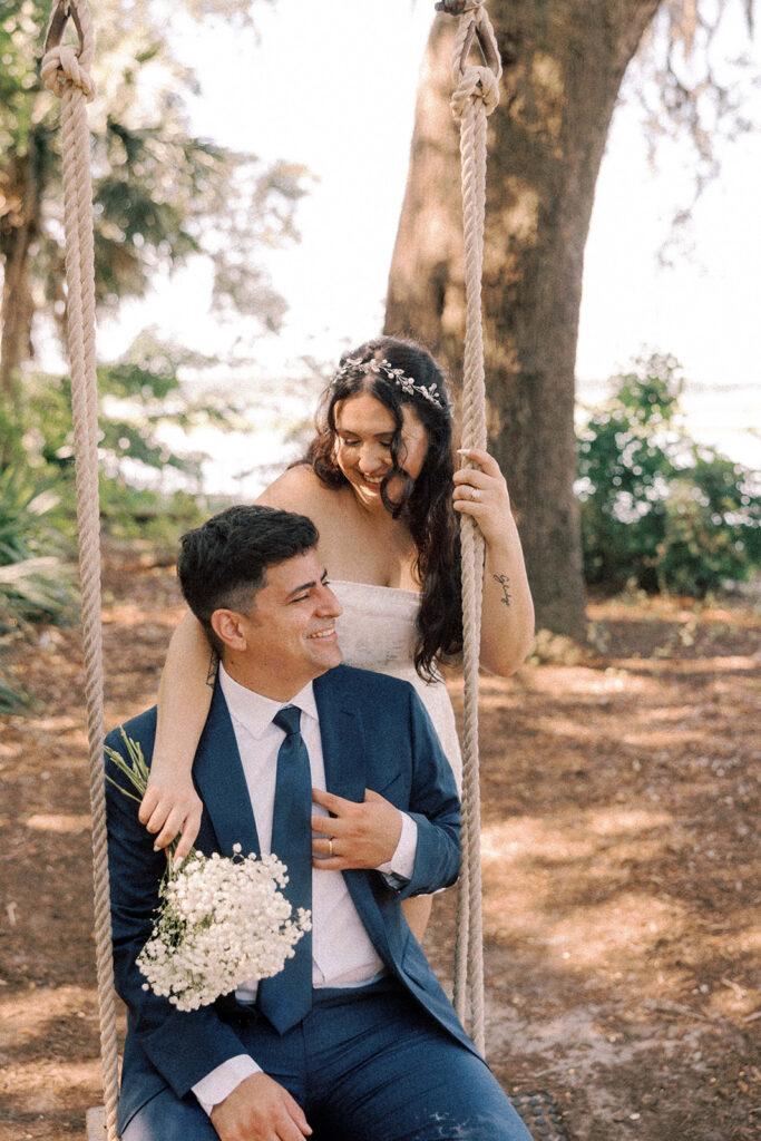 cute picture of the newlyweds smiling at each other 