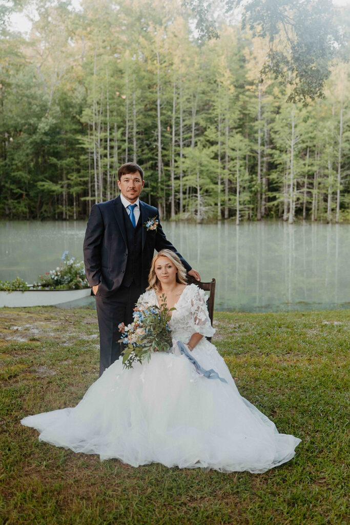 bride and groom posing for the camera during their bridal session