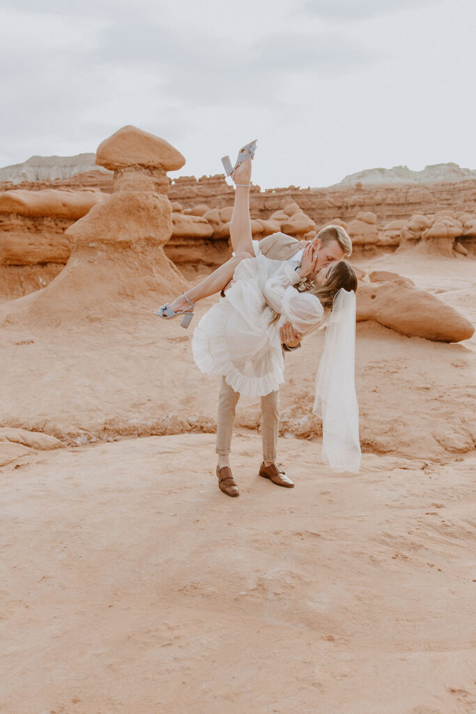 cute picture of the newlyweds kissing