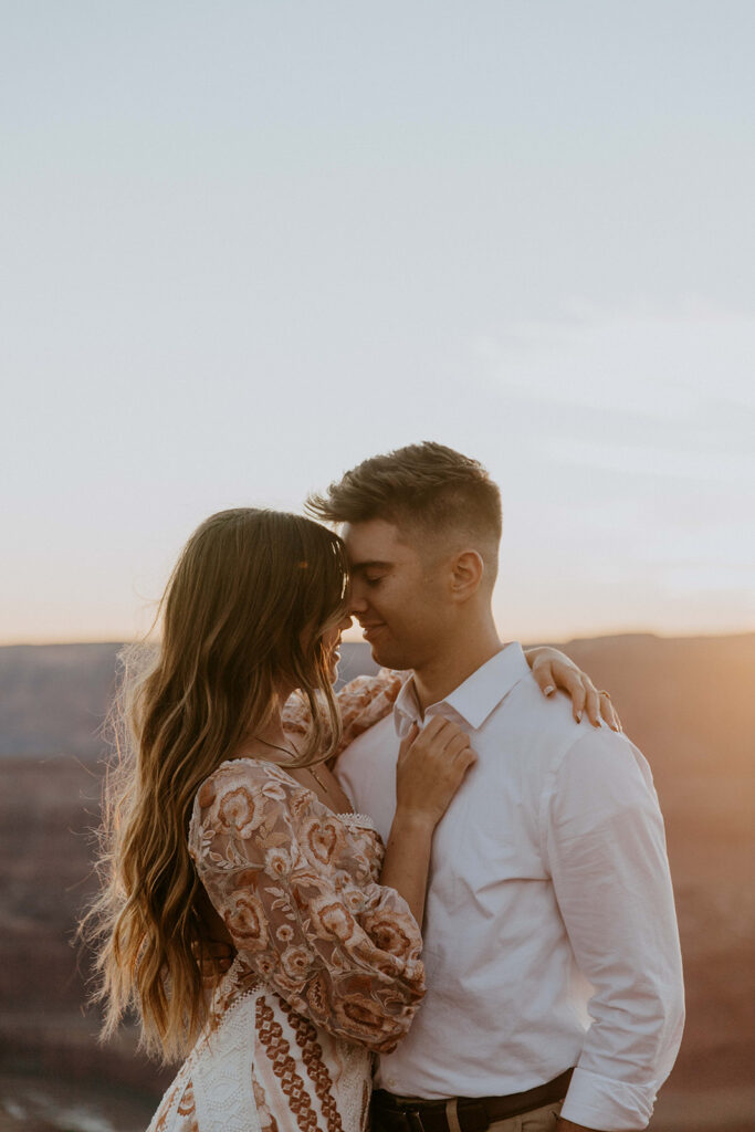 portrait of the newlyweds kissing