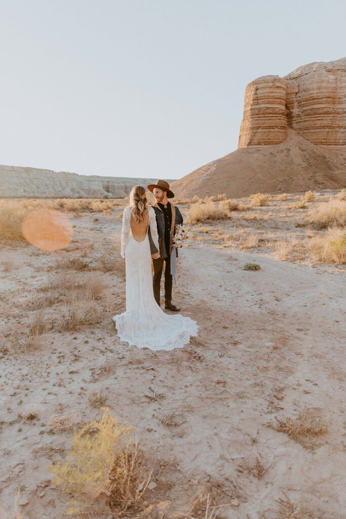 picture of the newlyweds holding hands