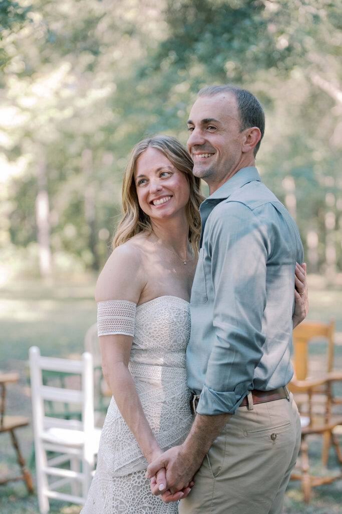 cute couple laughing with each other during their bridal portraits 