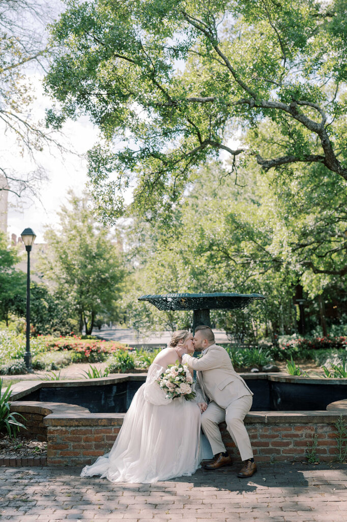 picture of the bride and groom kissing during their bridal portraits