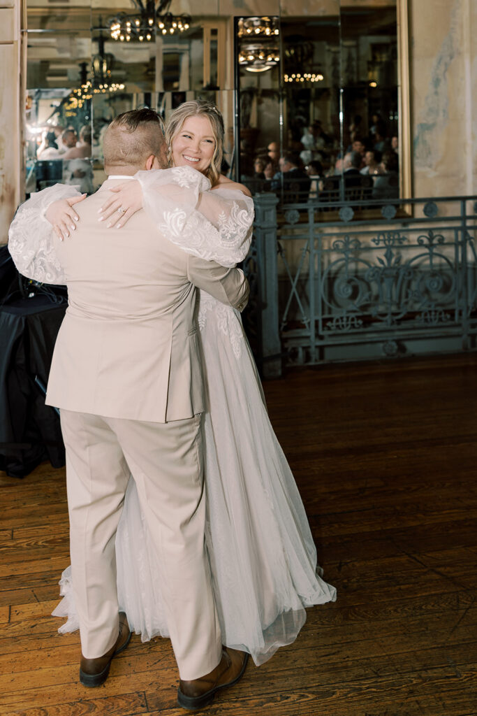 Newly married couple first dance at their reception