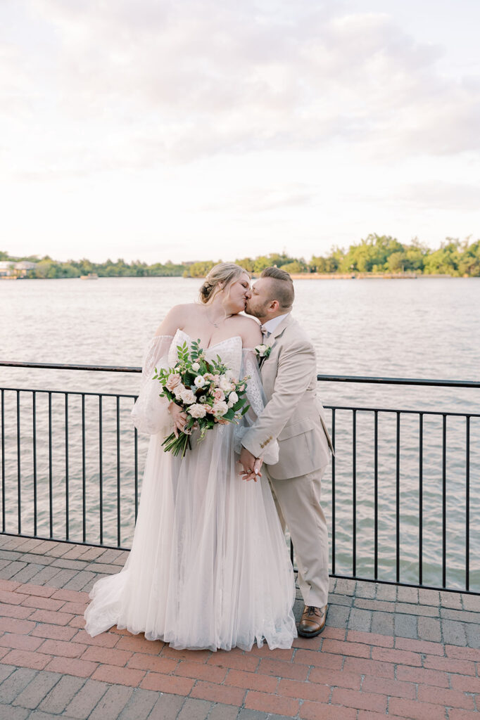 Picture of the newly married couple kissing