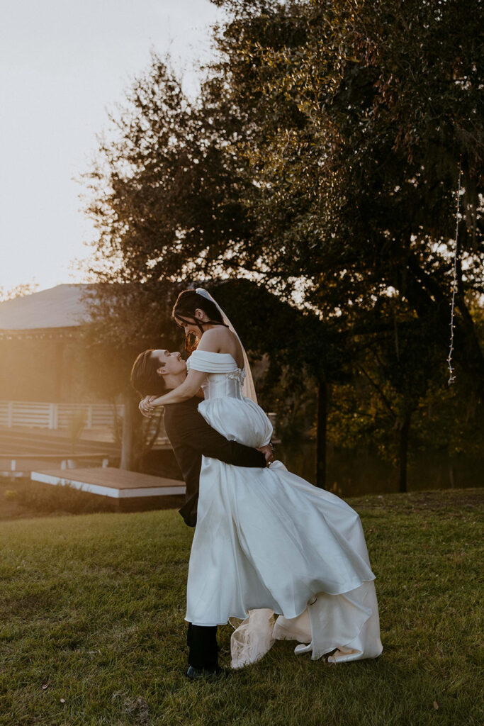 cute couple dancing during their bridal portraits 