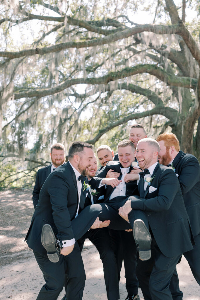 fun portrait of the groom and his friends