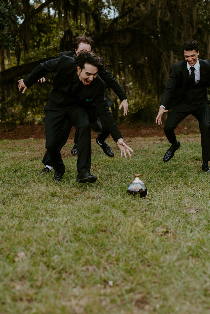 playful groomsmen portrais