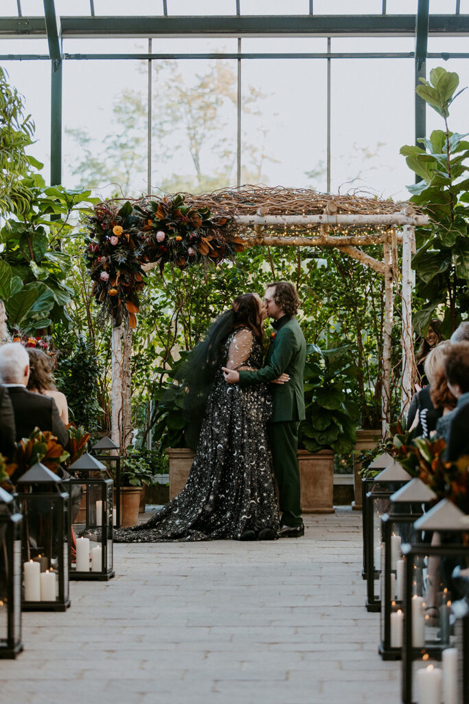 couple kissing after their ceremony