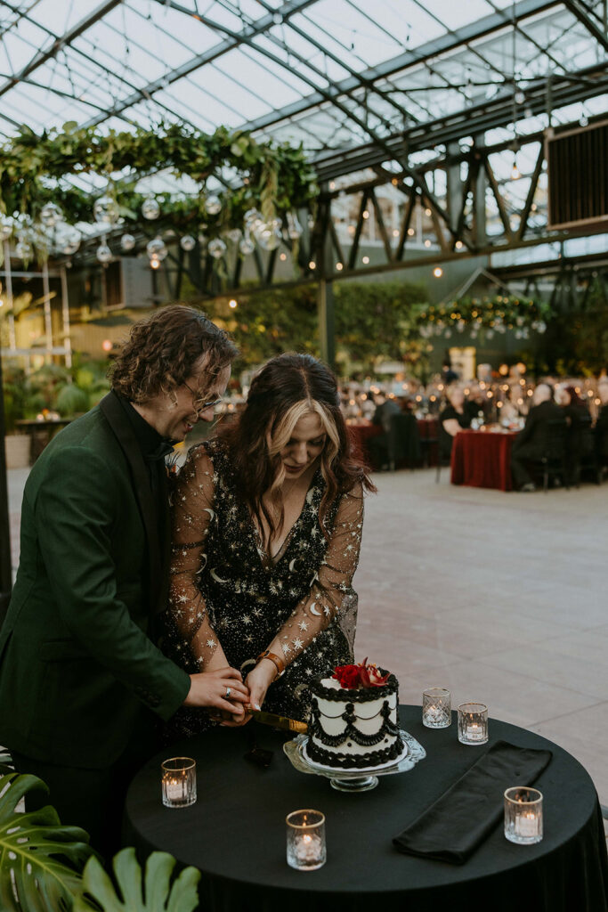 picture of the newlyweds cutting their wedding cake