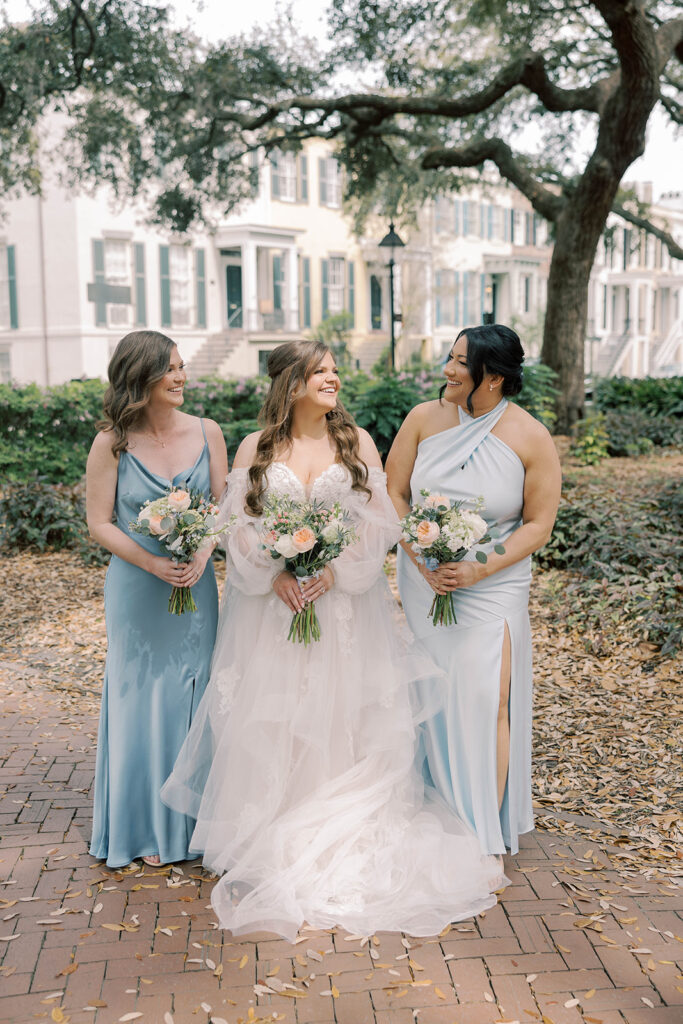 portrait of the bride and her friends laughing