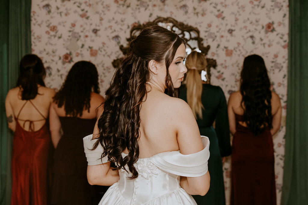 bride and her bridesmaids before their first look