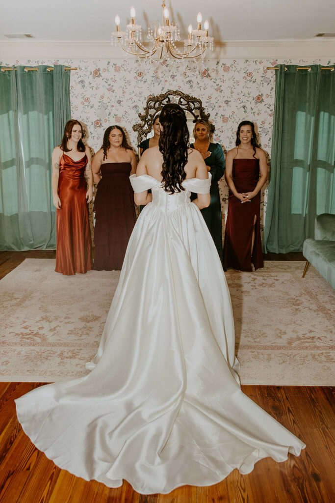 bride and her bridesmaids at her elegant wedding