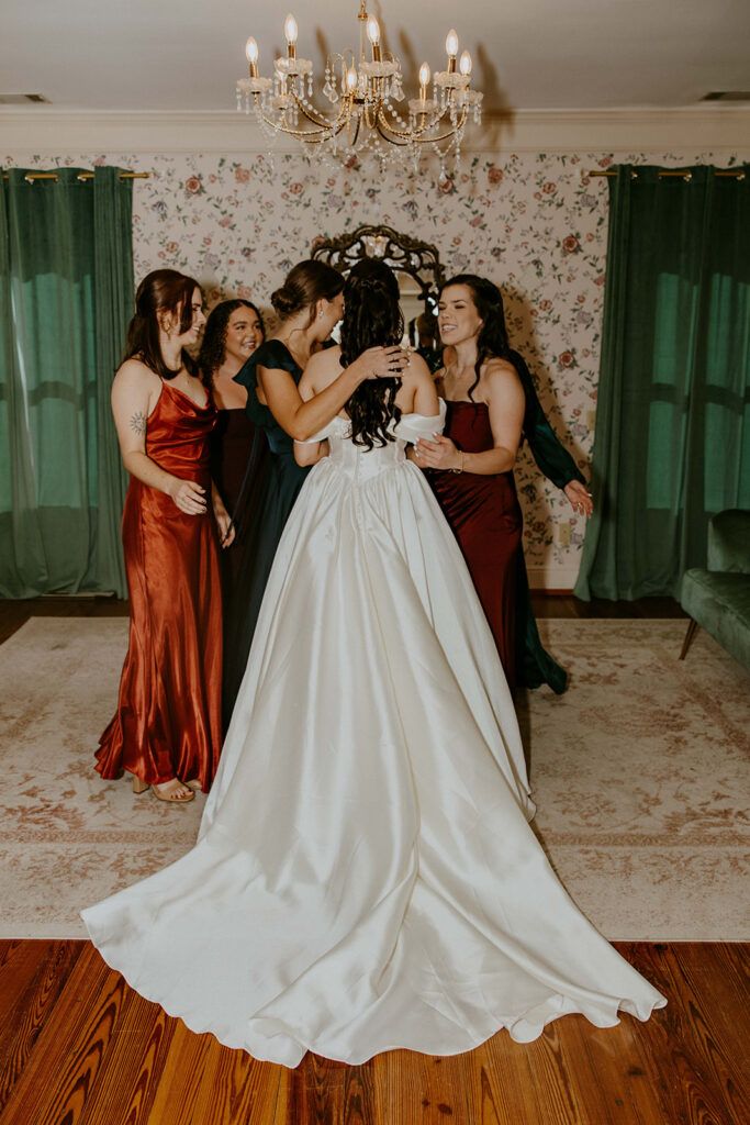 cute picture of the bride and her friends hugging