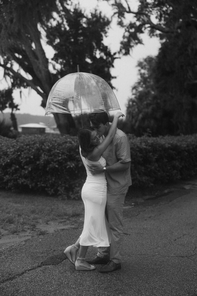 Cute couple at their rainy photoshoot day